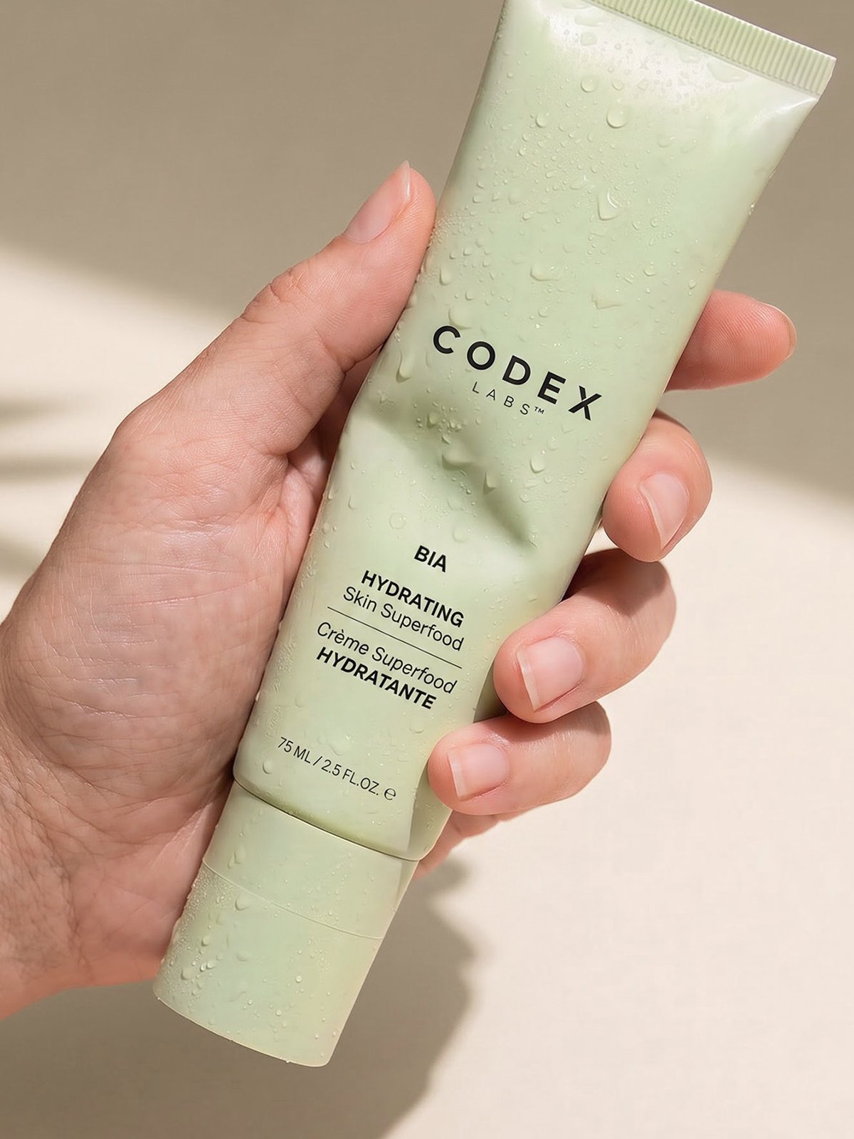 Codex Labs BIA cream in hand — controlled variation with stable product signal